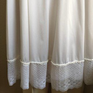 Bridal slip, midi, fitted front, full skirt, beaded bottom.